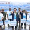 Program Jaminan Kesehatan JKN Diperluas, Pekerja Penanam Mangrove hingga RS Kapal Jadi Sorotan